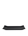 Black rectangular tray by Alessi with raised, curved short ends on a white background.