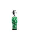 Anthropomorphic corkscrew by Alessi with a chrome face wearing a hat and a green body with a leaf pattern.