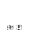 Two silver metal Barkring napkin holders by Alessi with organic tree bark-inspired cut-out designs.