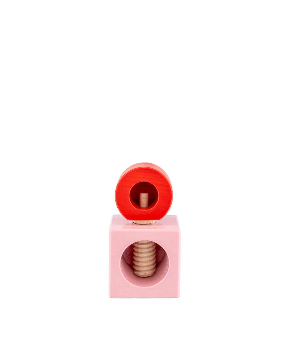 Red and pink wooden nutcracker by Alessi, featuring a red disc top and pink cube base with a visible screw.