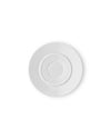 White round saucer by Alessi with concentric indentations, viewed from above, casting a soft shadow.