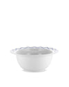 White salad serving bowl by Alessi with a blue geometric pattern on the rim.
