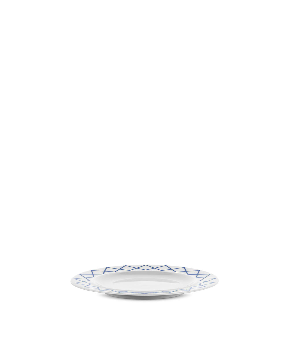 White ceramic side plate by Alessi with a blue diamond-shaped geometric pattern.