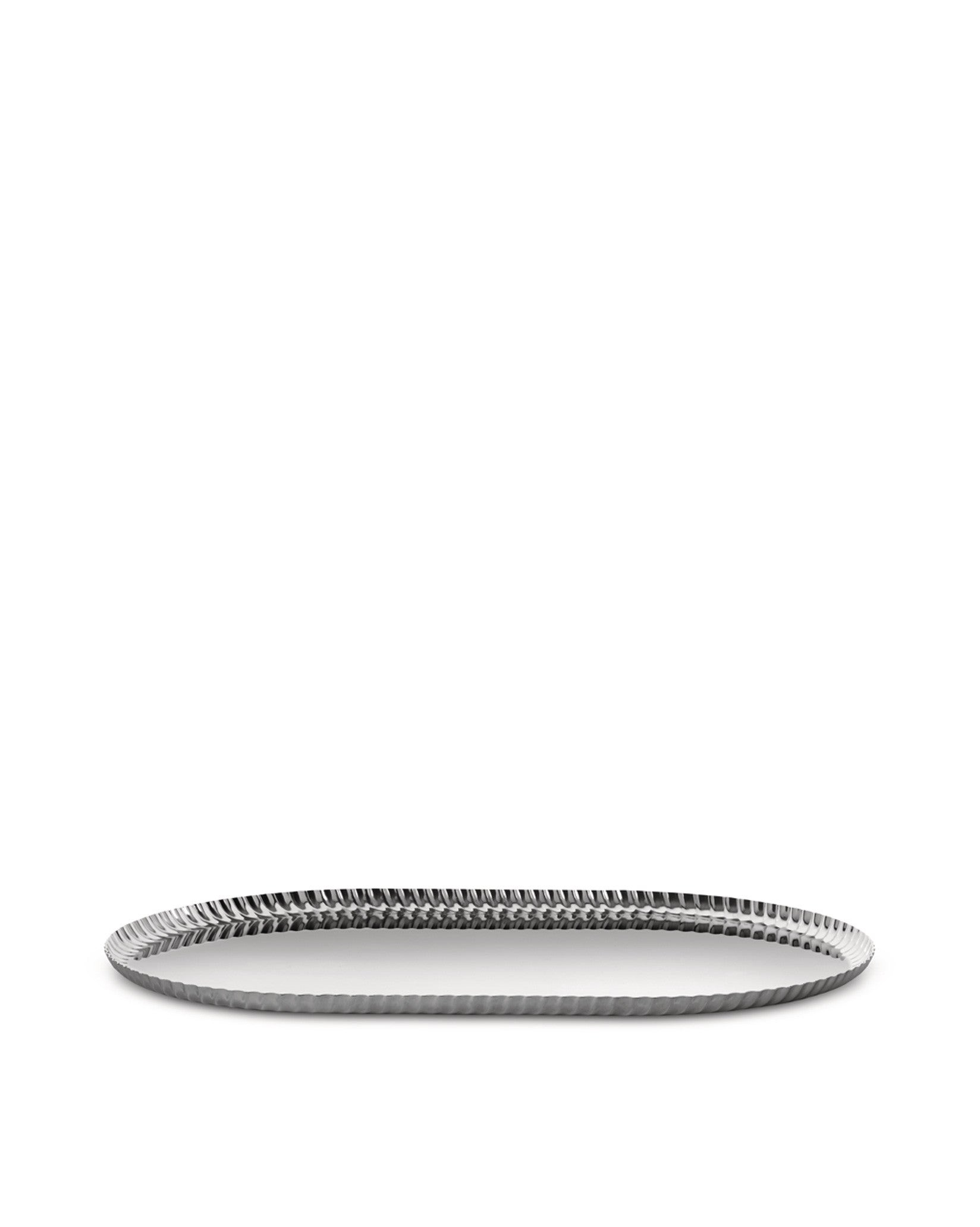 Silver metallic oval tray by Alessi with a distinctive pleated rim, viewed at an angle.