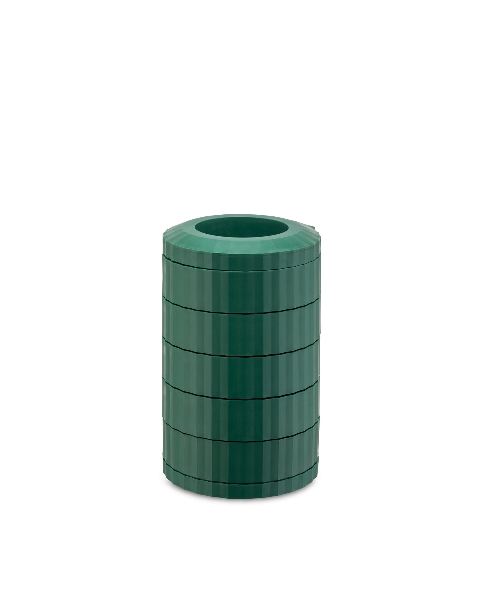 Dark green cylindrical capsule holder by Alessi, with pleated, stacked segments and an open top.
