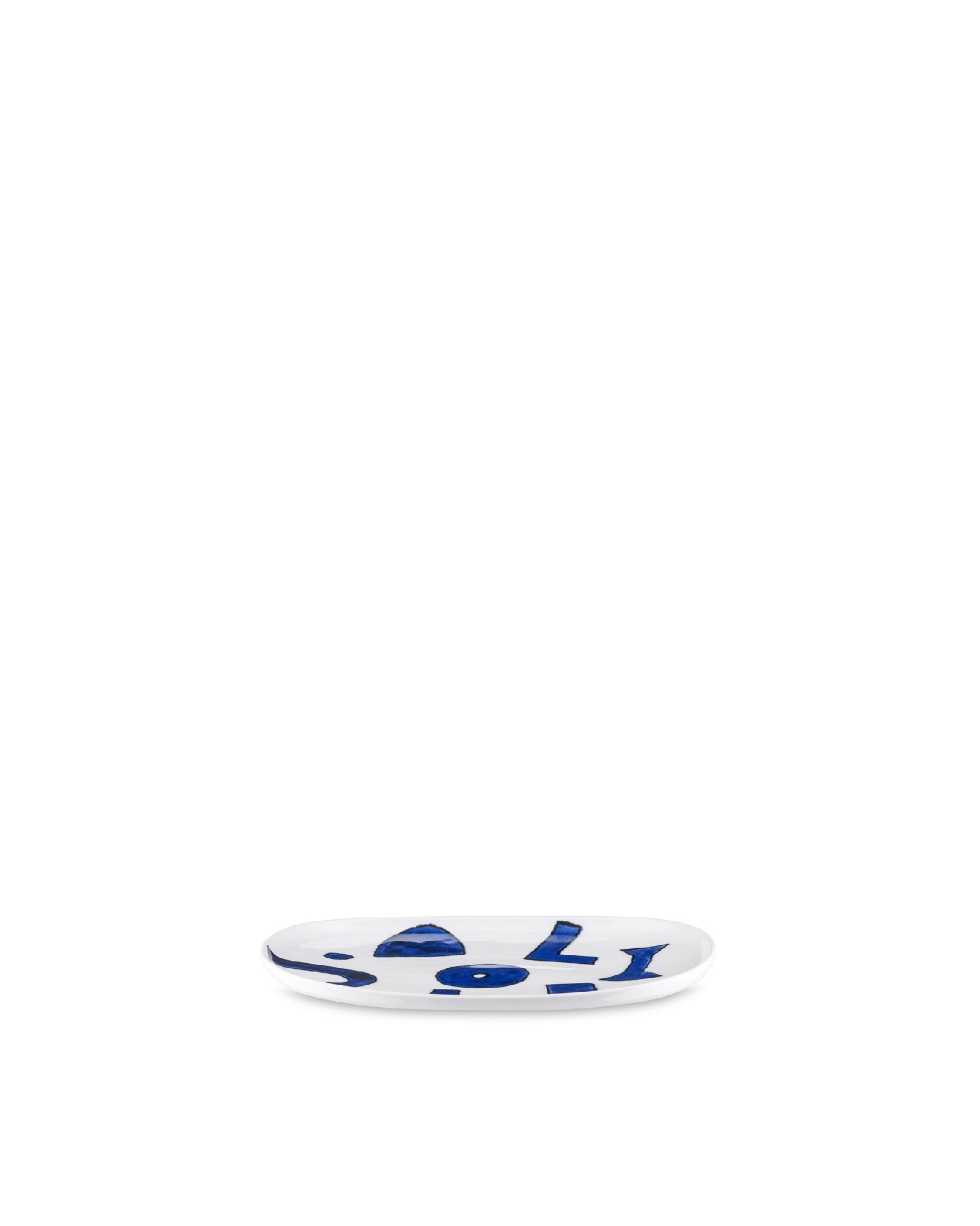 White oval serving platter by Alessi, decorated with abstract blue patterns, presented at an angle.