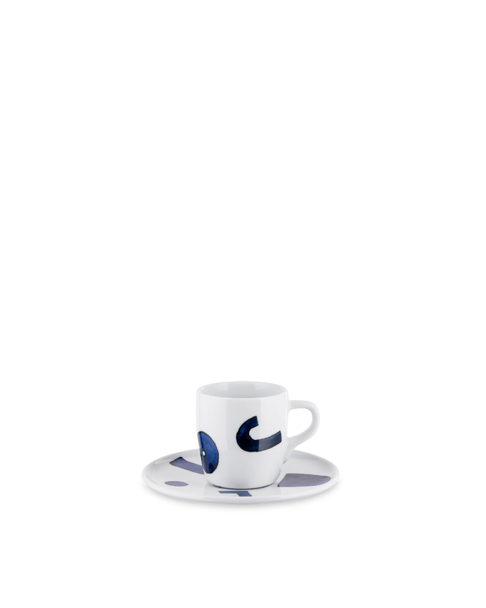 White ceramic espresso cup and saucer by Alessi, decorated with bold blue abstract shapes.