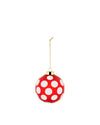 Red and white polka dot Christmas tree ornament by Alessi with a gold cap and hanging chain.