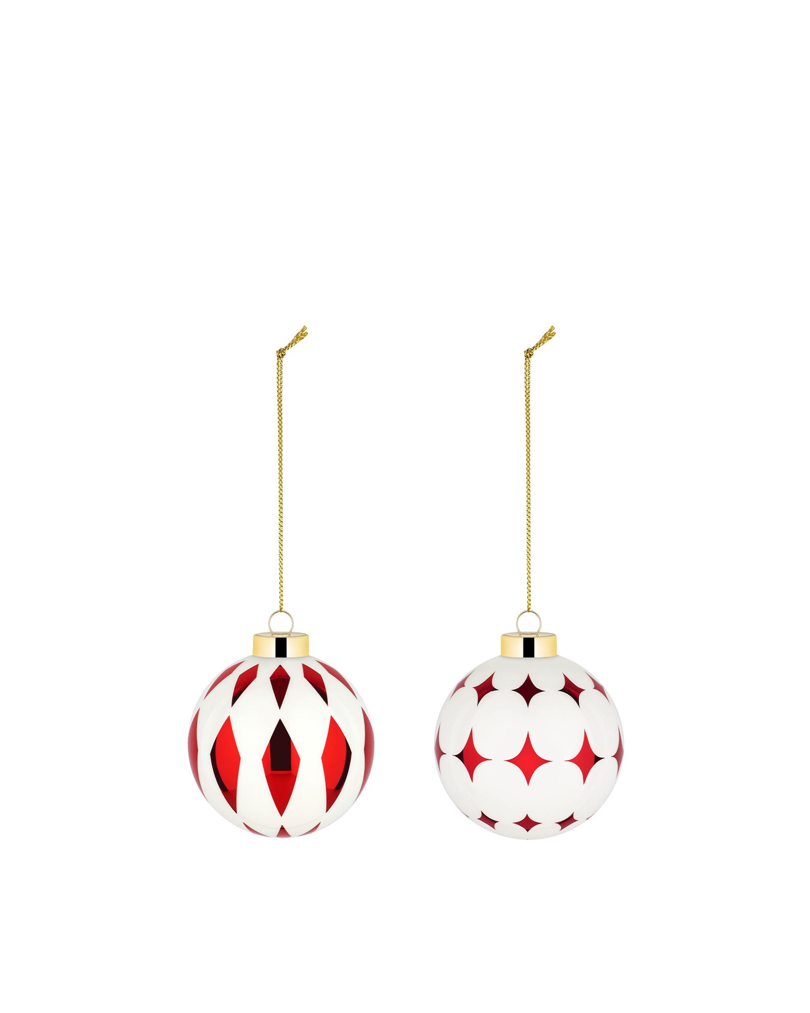 Two red and white Christmas tree ornaments by Alessi, one with red diamond cutouts and the other with red star cutouts, both with gold caps.