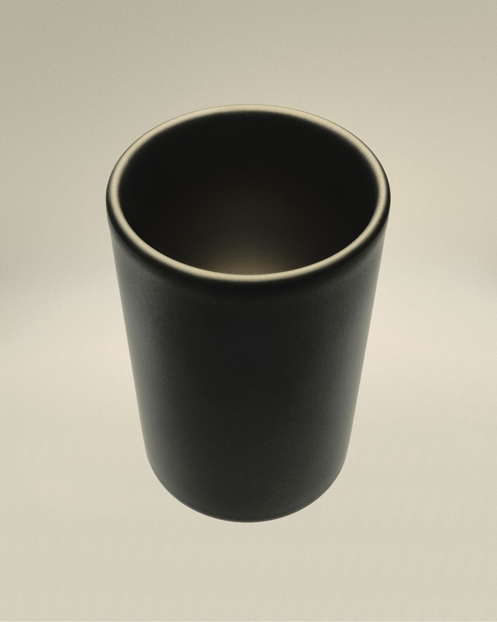 Dark grey matte cylindrical cup by Alessi, featuring a subtle rim highlight, viewed from above.