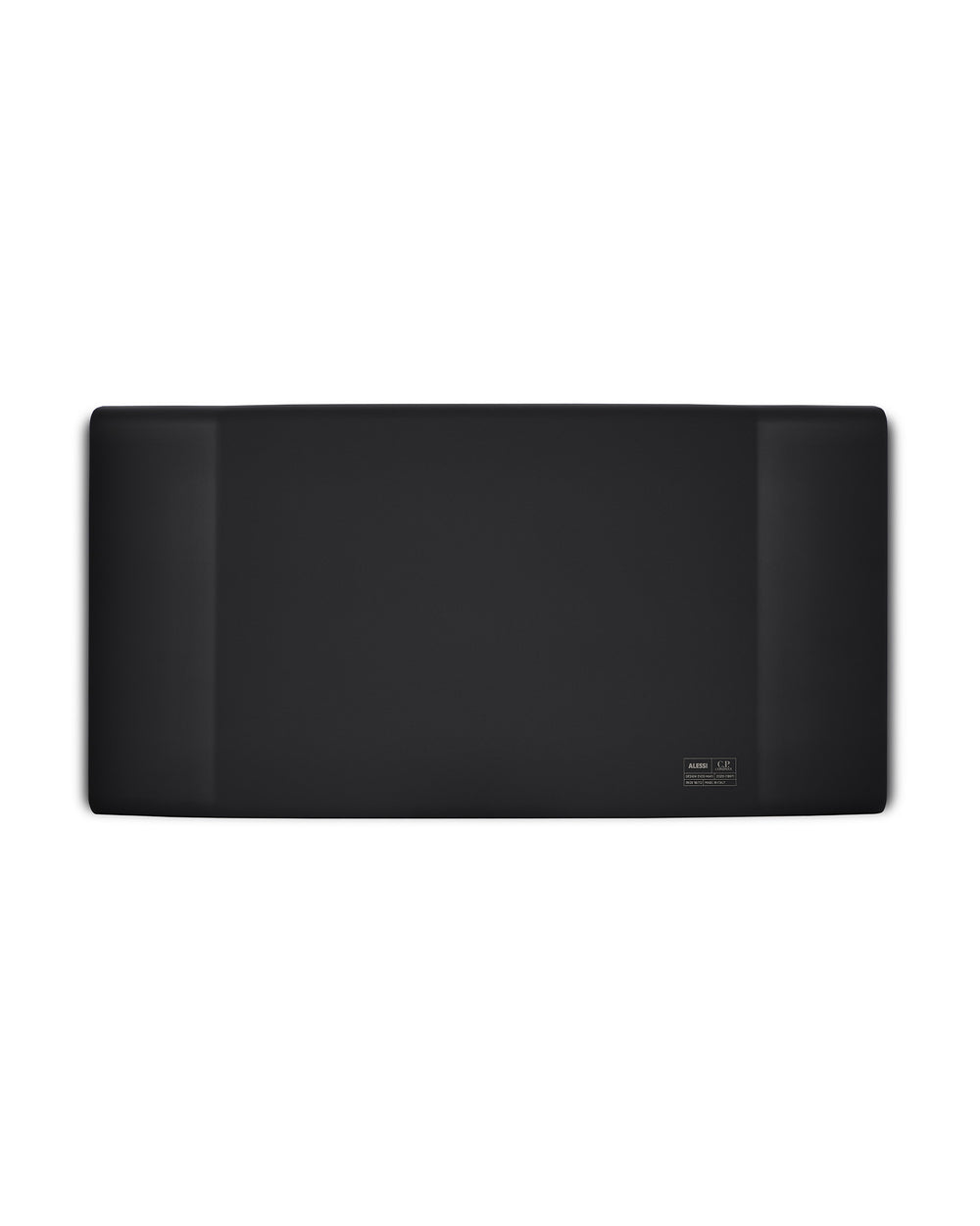 Black rectangular tray by Alessi with rounded edges and a brand label in the corner.