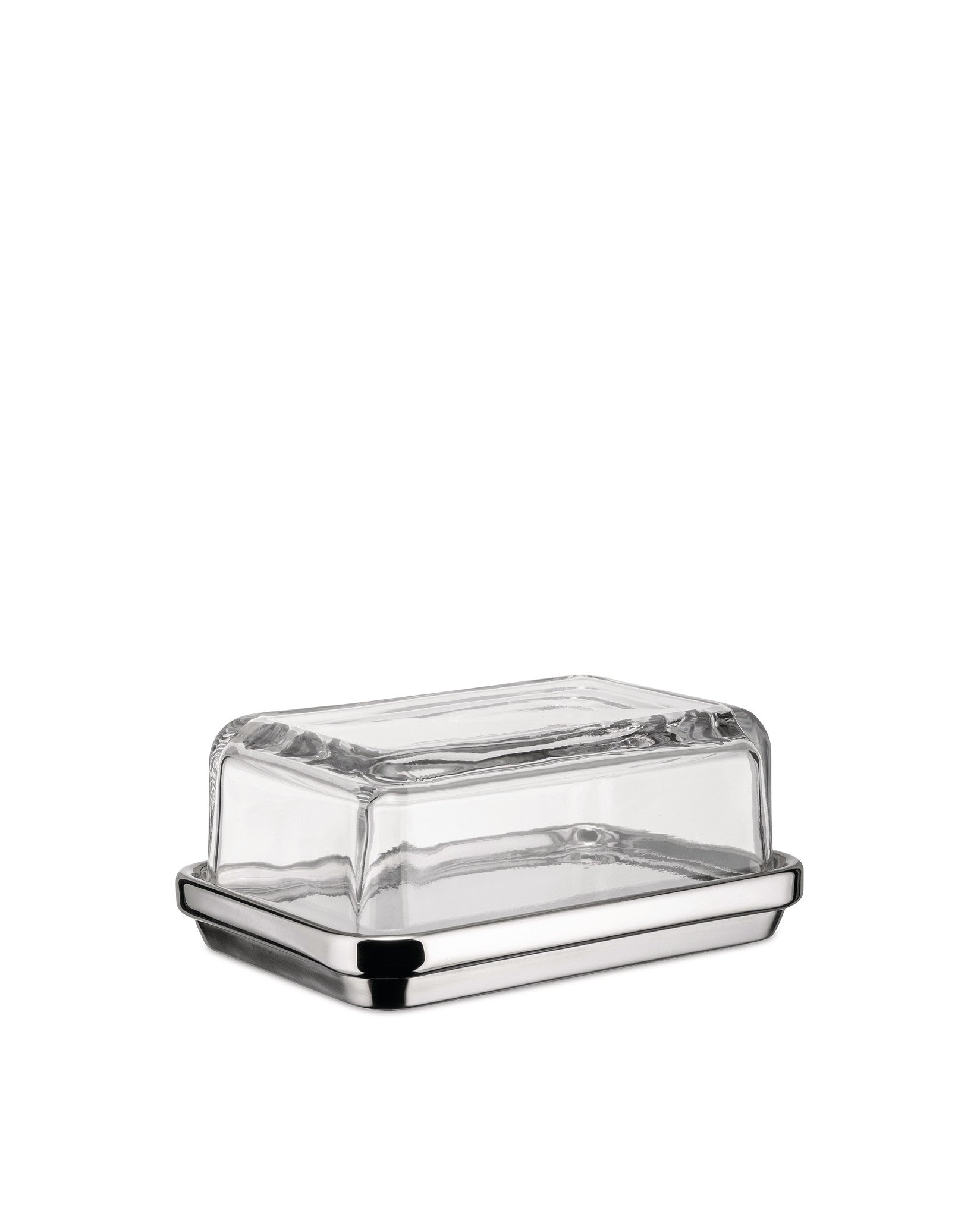 A rectangular butter dish with clear glass lid and polished stainless steel base by Alessi, shown from a slight angle.