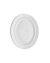 A white serving plate by Alessi, round with a raised rim, casting a soft shadow on a white background, viewed from above.