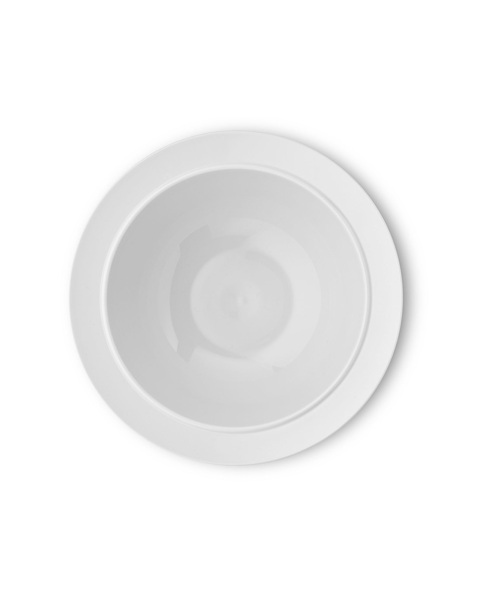 White round salad serving bowl by Alessi, La Bella Tavola design, with a wide rim, viewed from above.