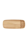 Wooden serving plate by Alessi, with an engraved decorative pattern on the right side.