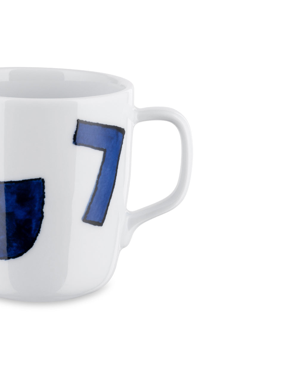 White ceramic mug by Alessi with a hand-painted blue number 7 and a partial blue design, cropped side view.