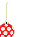 Red polka dot Christmas tree ornament by Alessi with a gold top and hanging chain, cropped.
