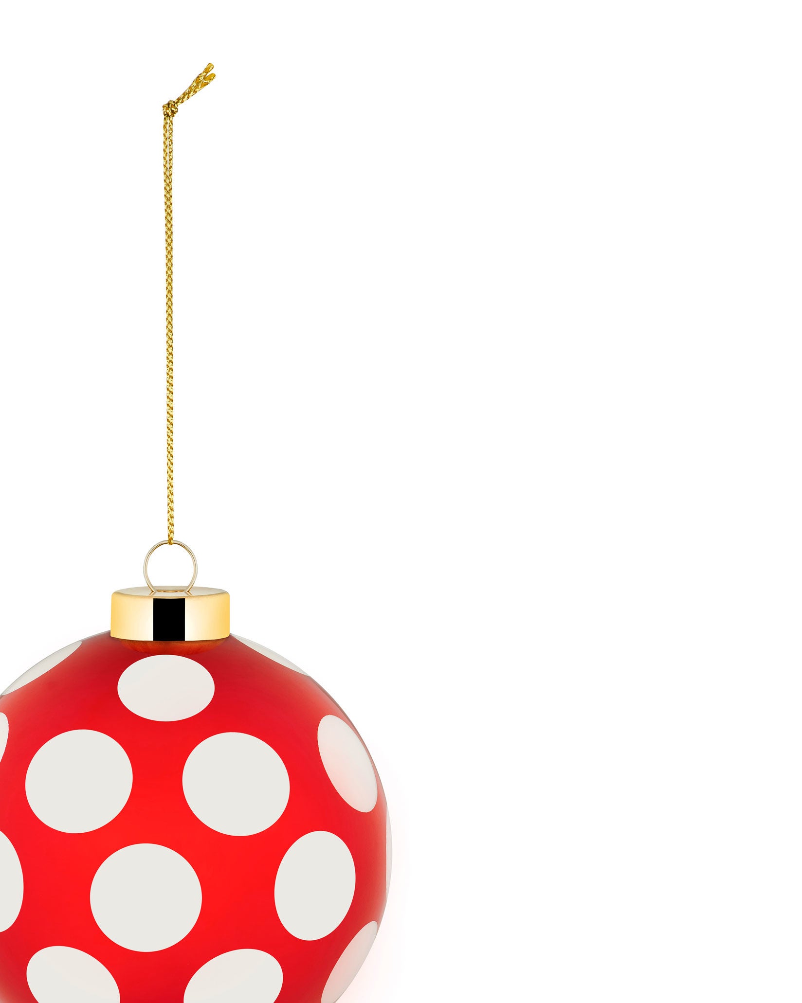 Red polka dot Christmas tree ornament by Alessi with a gold top and hanging chain, cropped.