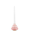 Glossy white and red candlestick by Alessi, shaped like a tiered Christmas tree with vertical stripes, holding a white candle.