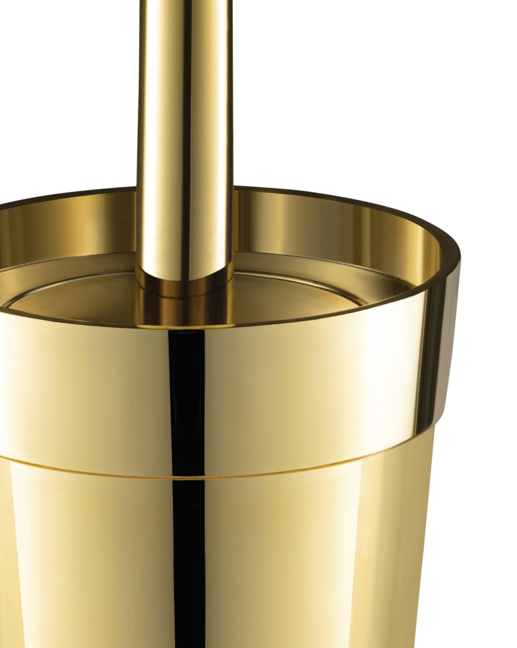 Gold toilet brush by Alessi, a cropped close-up highlighting its reflective, sleek design.