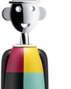 Figural corkscrew by Alessi, featuring a chrome smiling head and a body with red, yellow, black, and teal sections.
