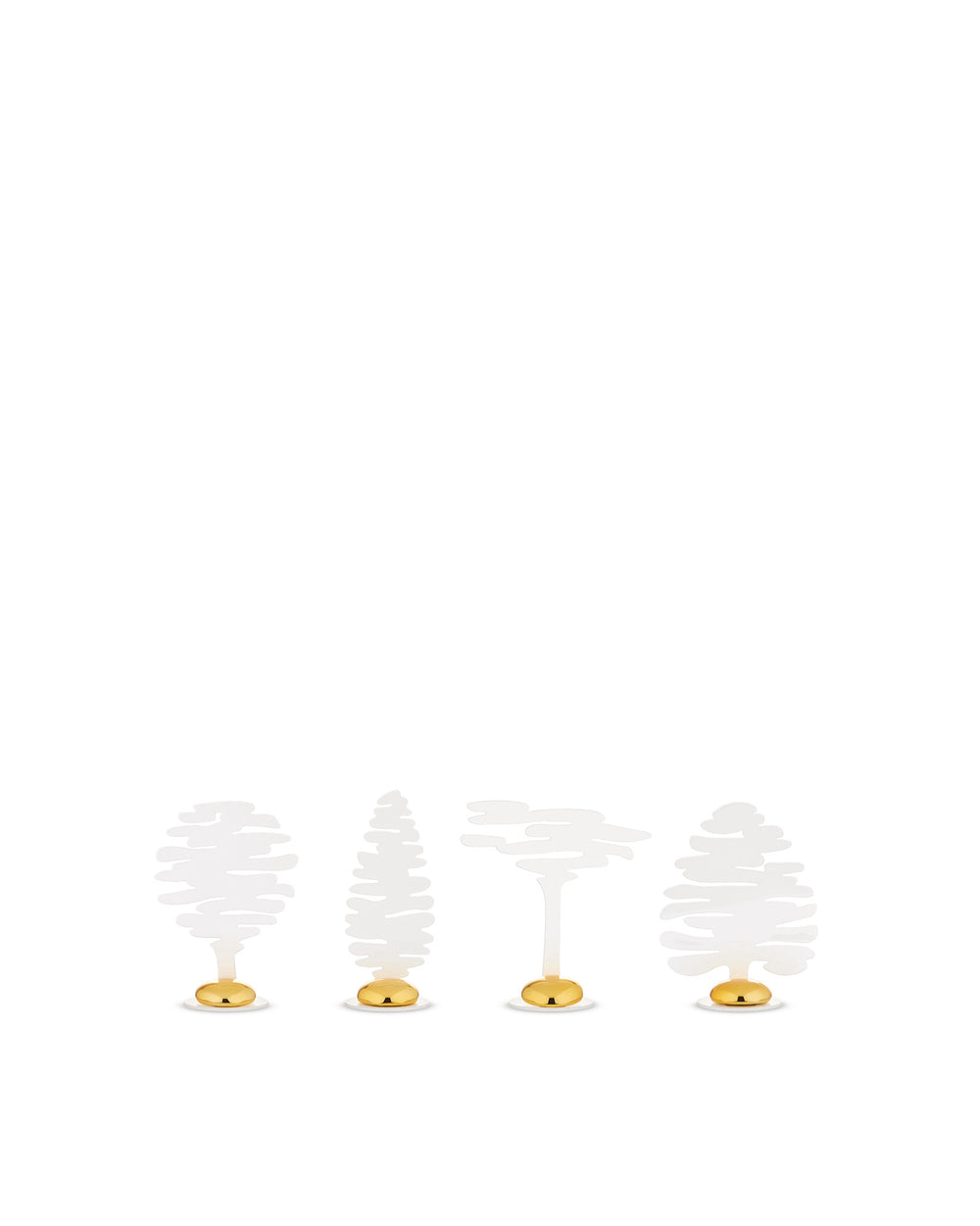 White and gold Barkplace Tree place markers by Alessi, in four distinct abstract tree designs.