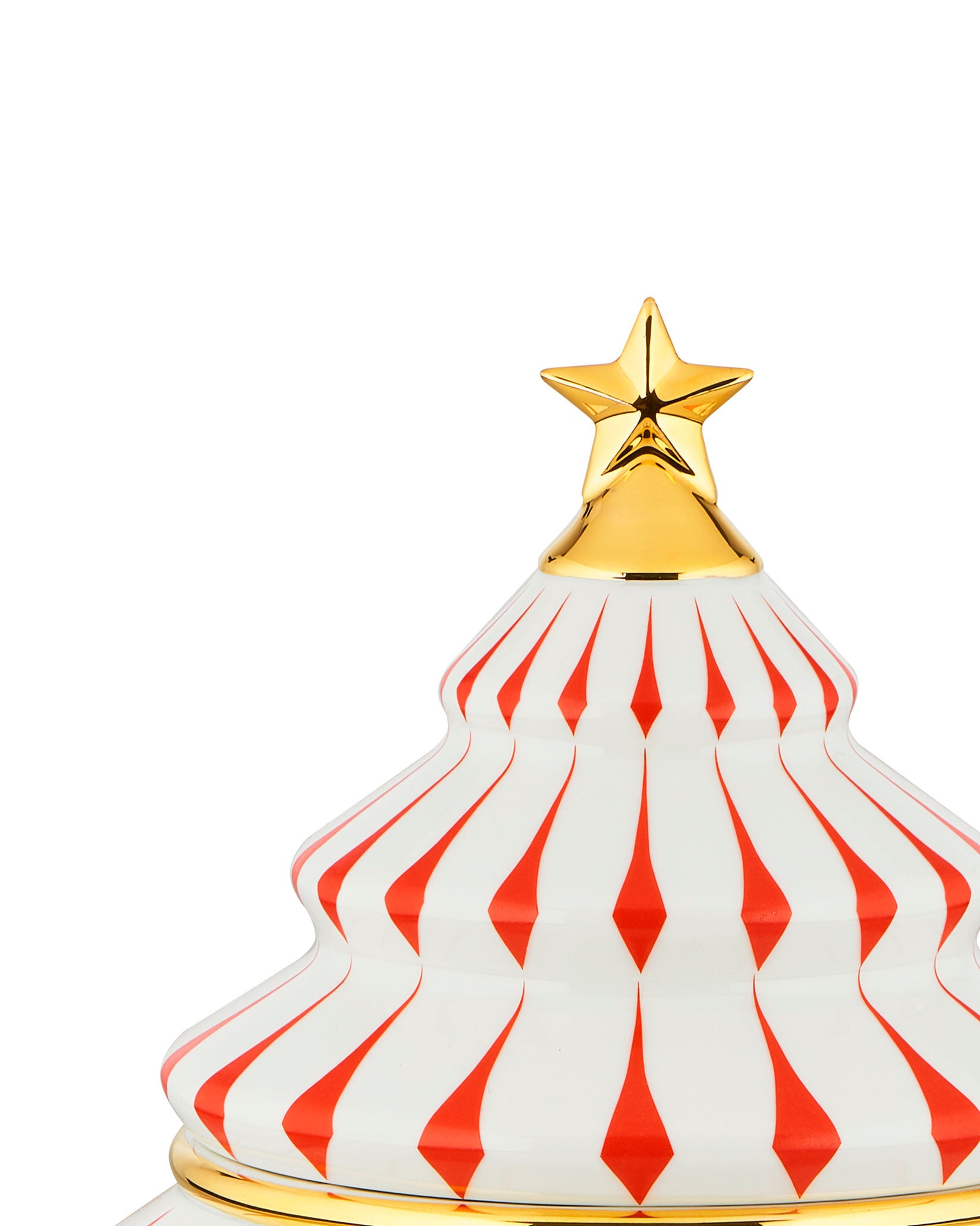 A white Christmas tree-shaped table accessory by Alessi, with red striped patterns, a gold star topper, and gold trim.