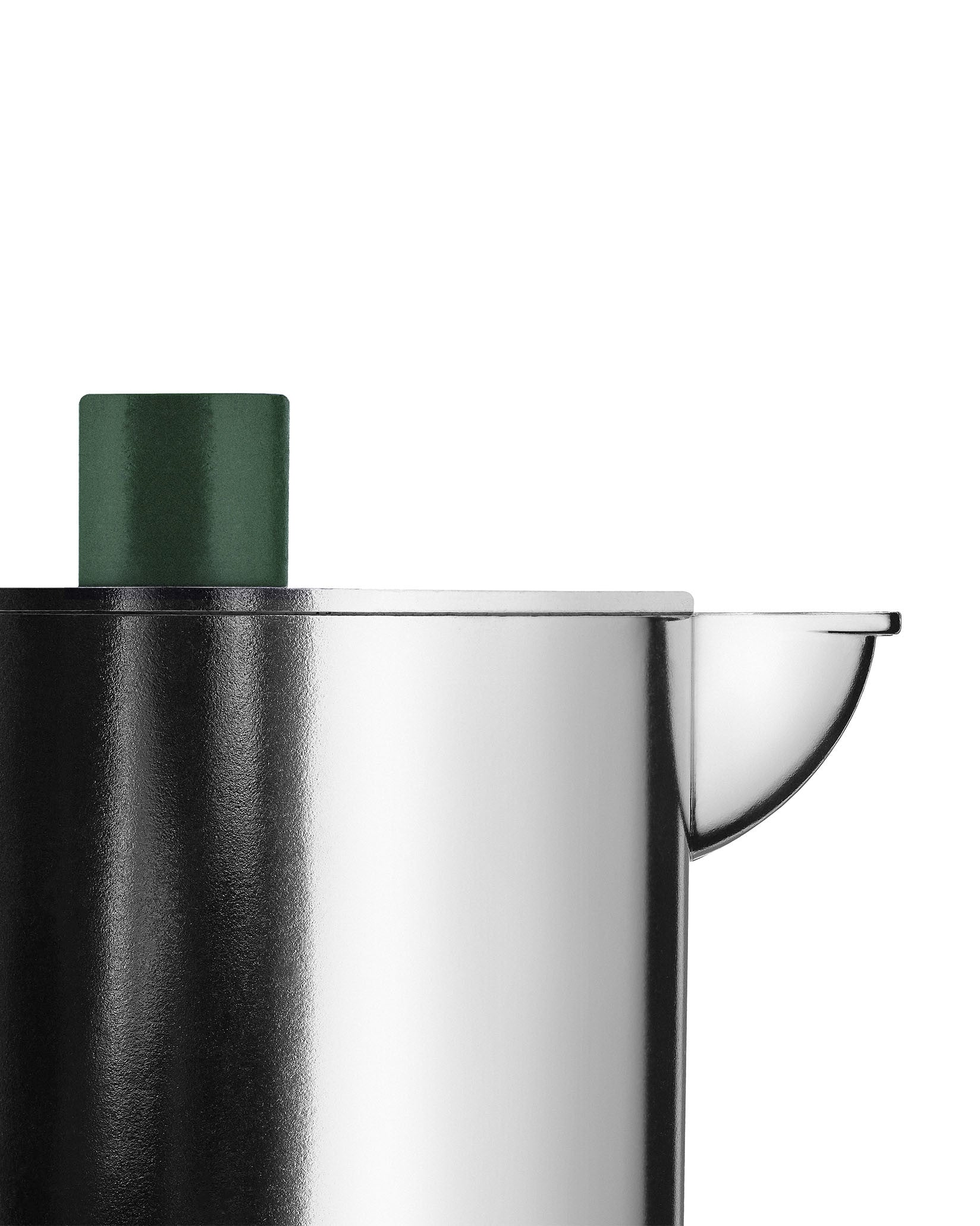 Silver metallic espresso coffee maker by Alessi with a dark green cylindrical top, cropped view.
