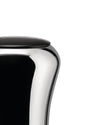 Polished chrome laundry basket with a black wood lid by Alessi, showing a curved body and wood grain texture, cropped side view.