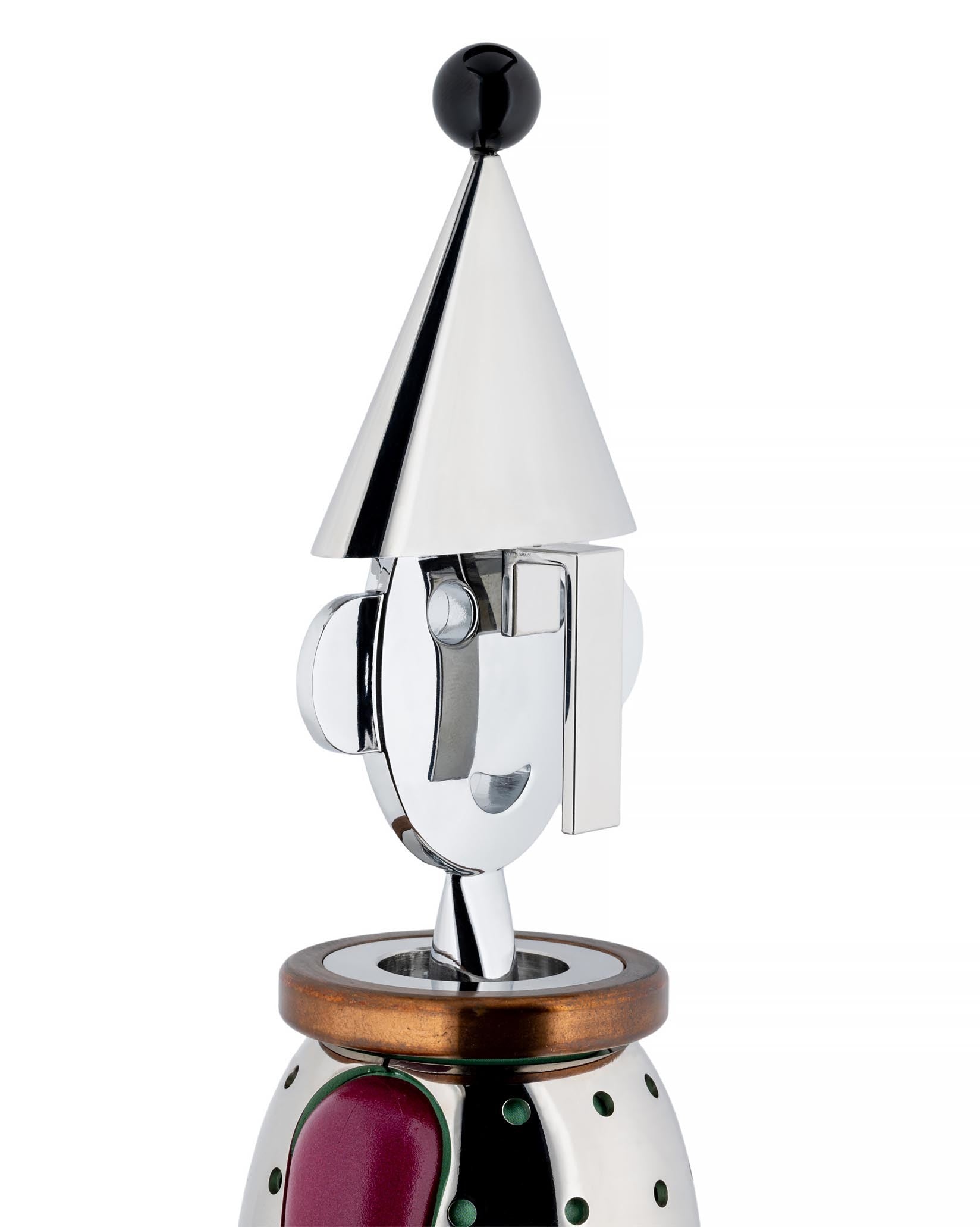 Chrome corkscrew by Alessi with a conical hat, black finial, and stylized face design above a wooden collar.