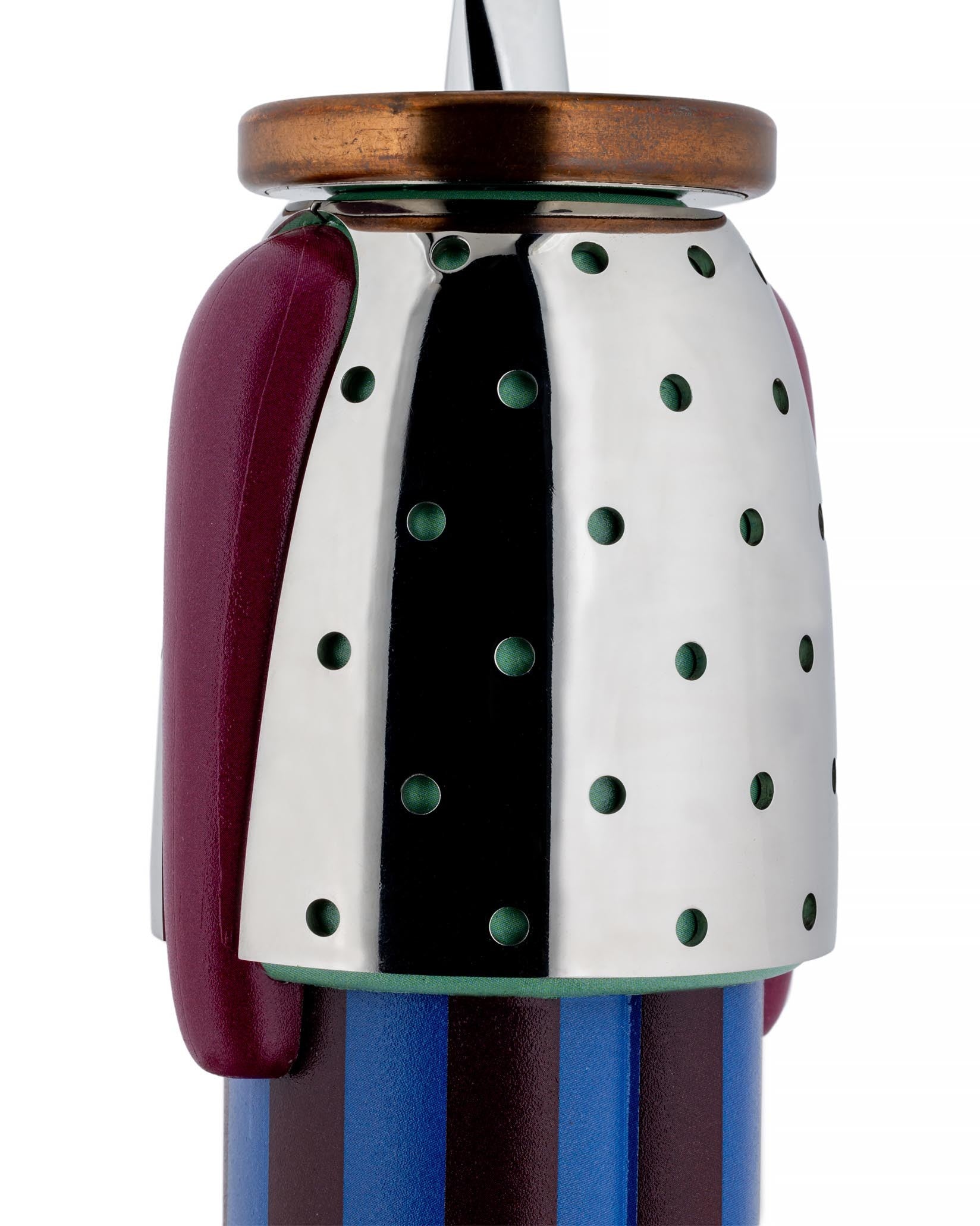 Figural corkscrew by Alessi, with a metallic silver and black upper body featuring green holes, a maroon arm, copper top, and striped blue base.