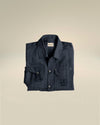 Dark blue linen jacket by Alessi, with visible Alessi and C.P. Company logos on the collar and chest pocket.