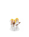 Three white ornamental angelic figurines by Alessi, with yellow hair, playing flute, violin, and guitar on a cloud base.