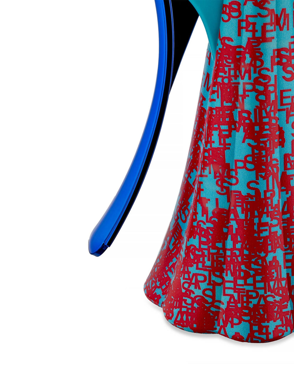 Blue and red letter-patterned corkscrew by Alessi, with a blue lever and scalloped base, cropped side view.