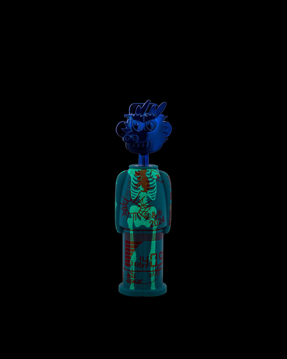 Blue and teal figurine corkscrew by Alessi, featuring a monster head and glowing skeleton body with red patterns.