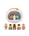 White ceramic stylized Nativity scene set by Alessi, depicting a shelter with a golden star and ten colorful figures.