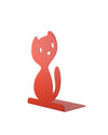 Red cat-shaped metal bookstand by Alessi with a matte finish, seen from an angled view.