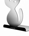 Silver abstract cat bookend by Alessi, with a black base and "Geography" text.