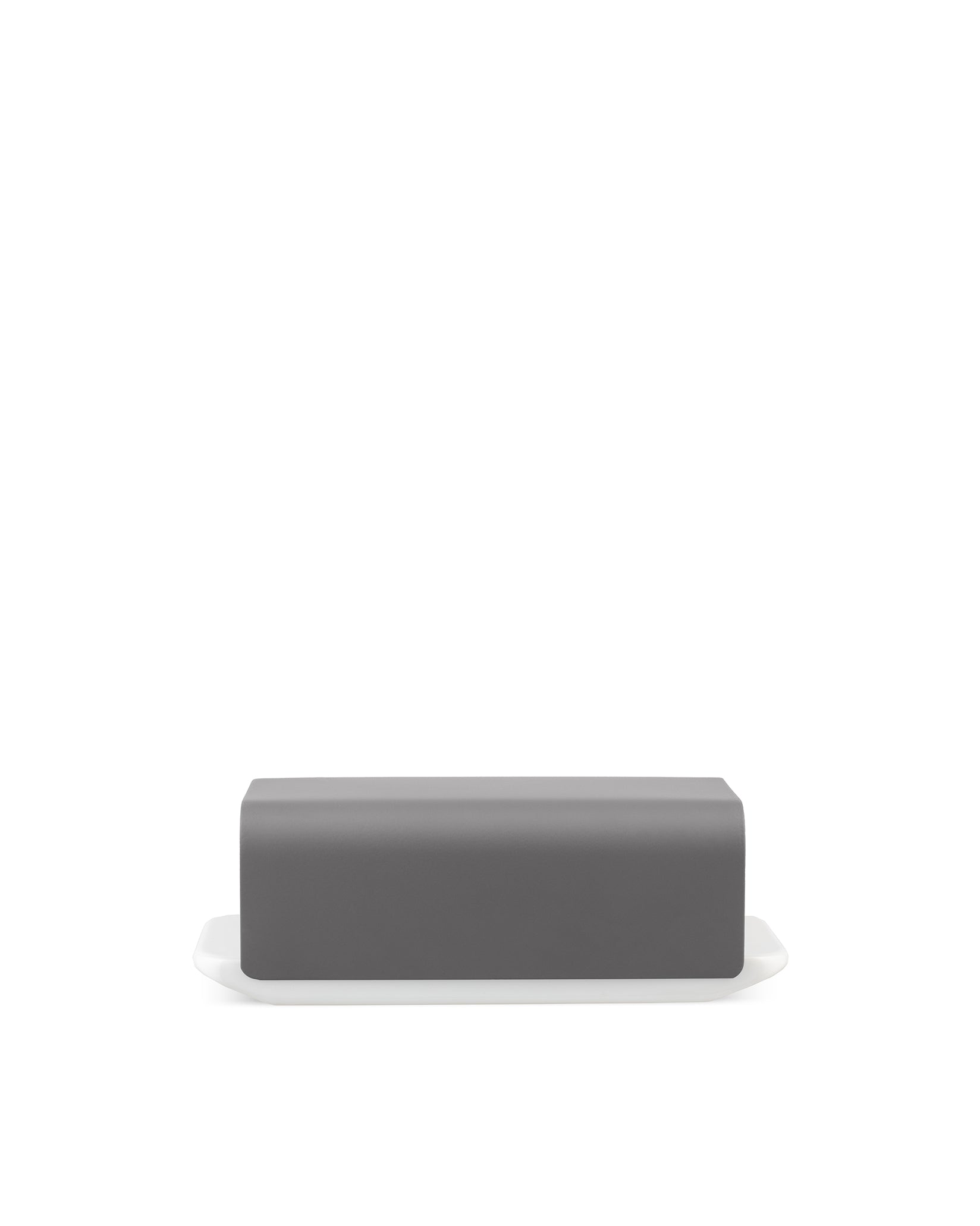 Dark grey butter dish by Alessi, with a white base and rounded rectangular lid.