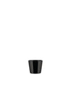 Black cup by Alessi with a glossy finish and tapered form, shown from the front.