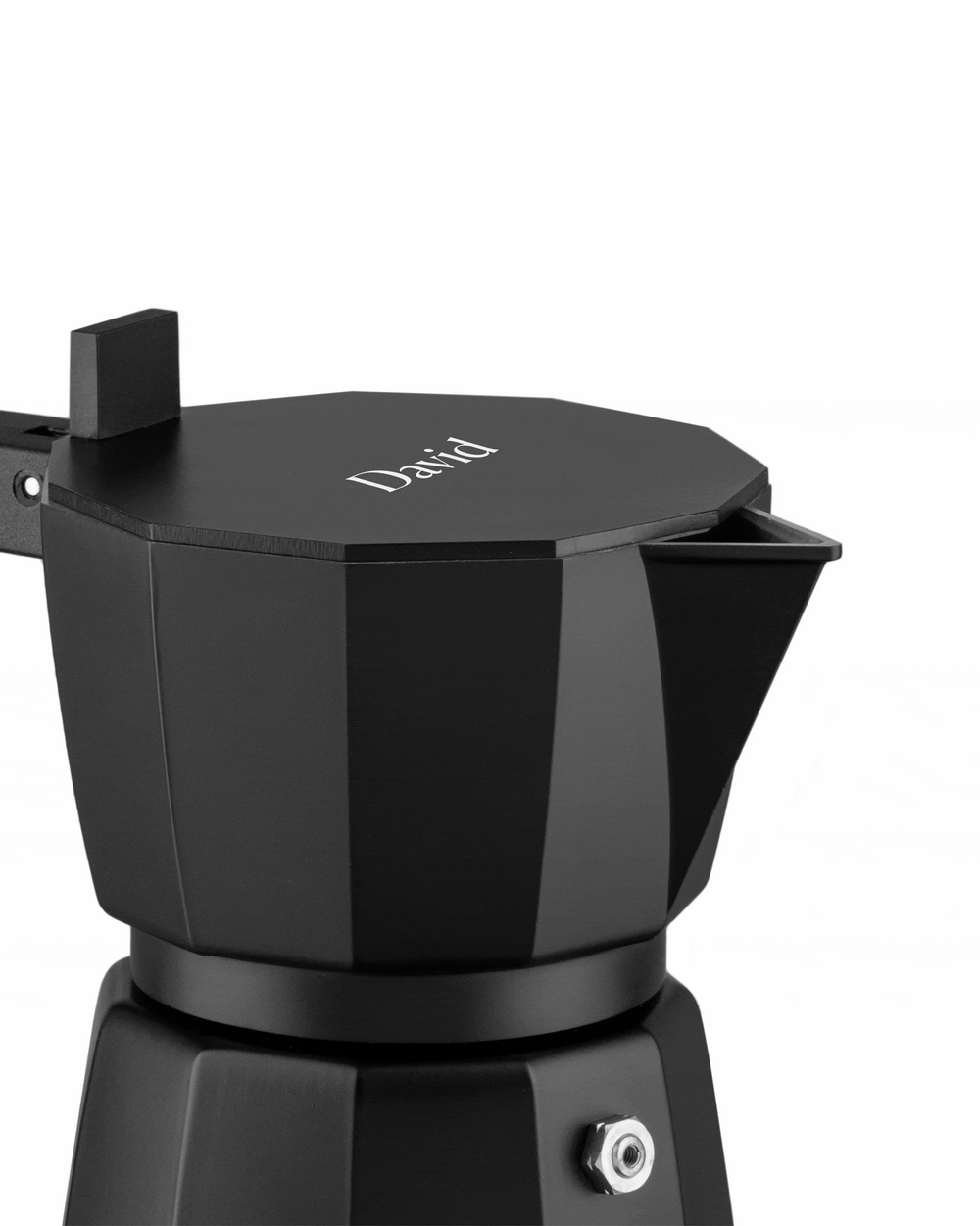 Black octagonal Moka pot by Alessi, with a matte finish, 'David' text on its lid, a silver pressure valve, and a black rectangular handle.