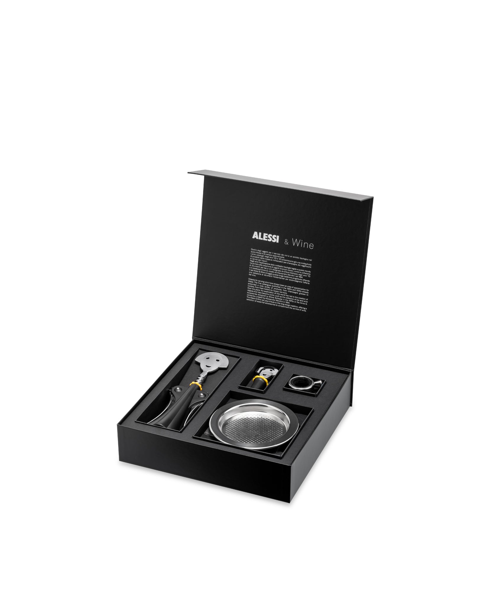 Black wine accessories set by Alessi in an open box, displaying silver tools with yellow accents.