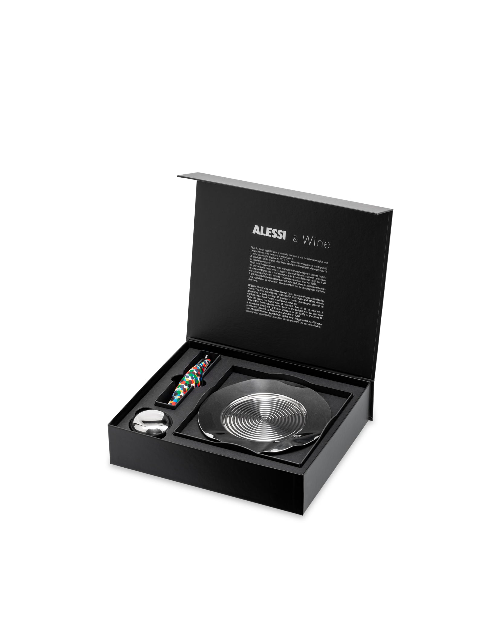 Wine mixology set in an open black presentation box by Alessi, with a colorful polka-dot corkscrew, silver pourer, and a spiral-patterned coaster.