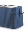 Blue ribbed toaster by Alessi, with vertical pleats and a side control panel.