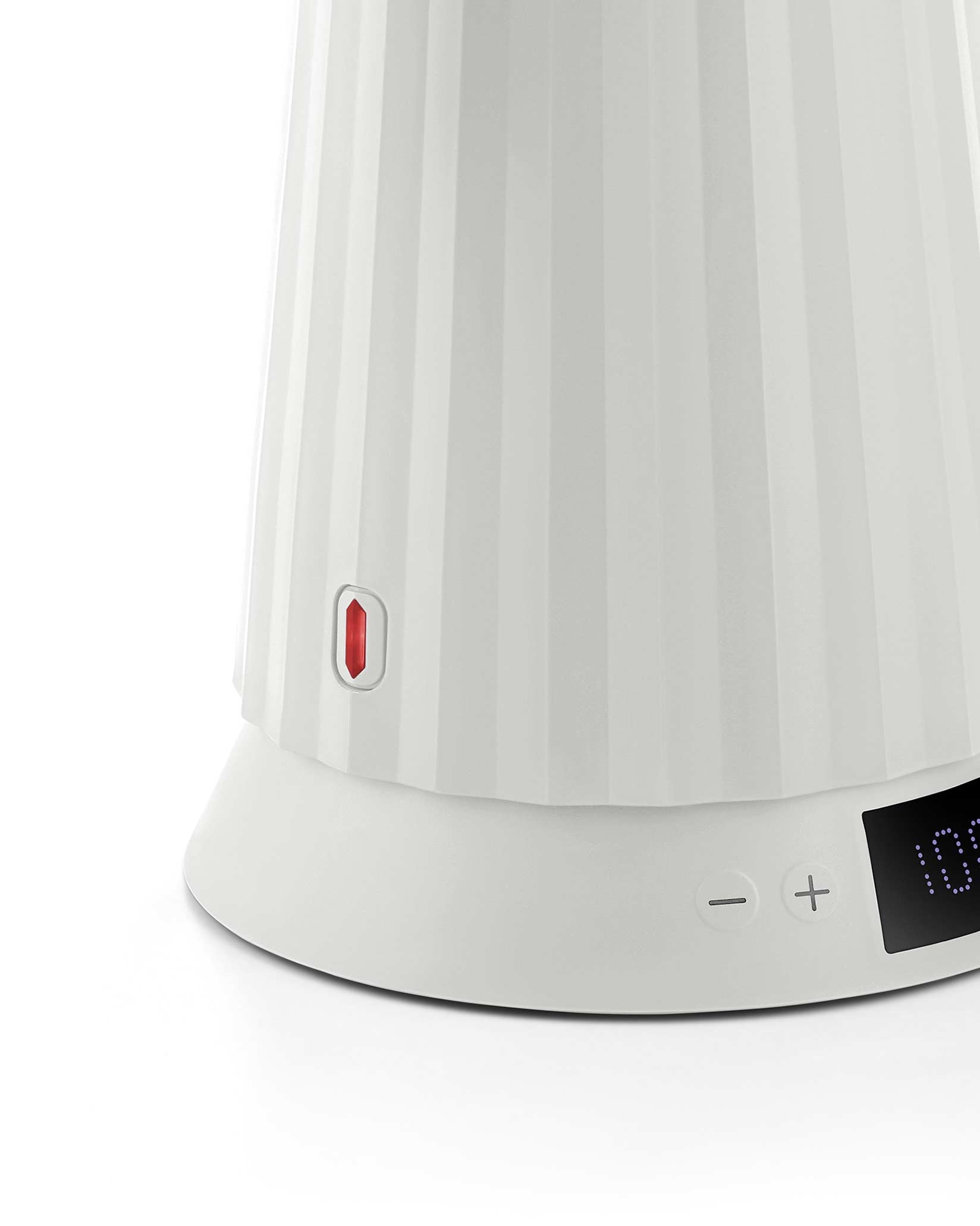 White pleated electric kettle by Alessi, with a red water indicator and digital temperature display showing 109.