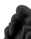 Black, matte textured Dédé doorstop by Alessi, showing abstract, organic curved forms in a close-up.
