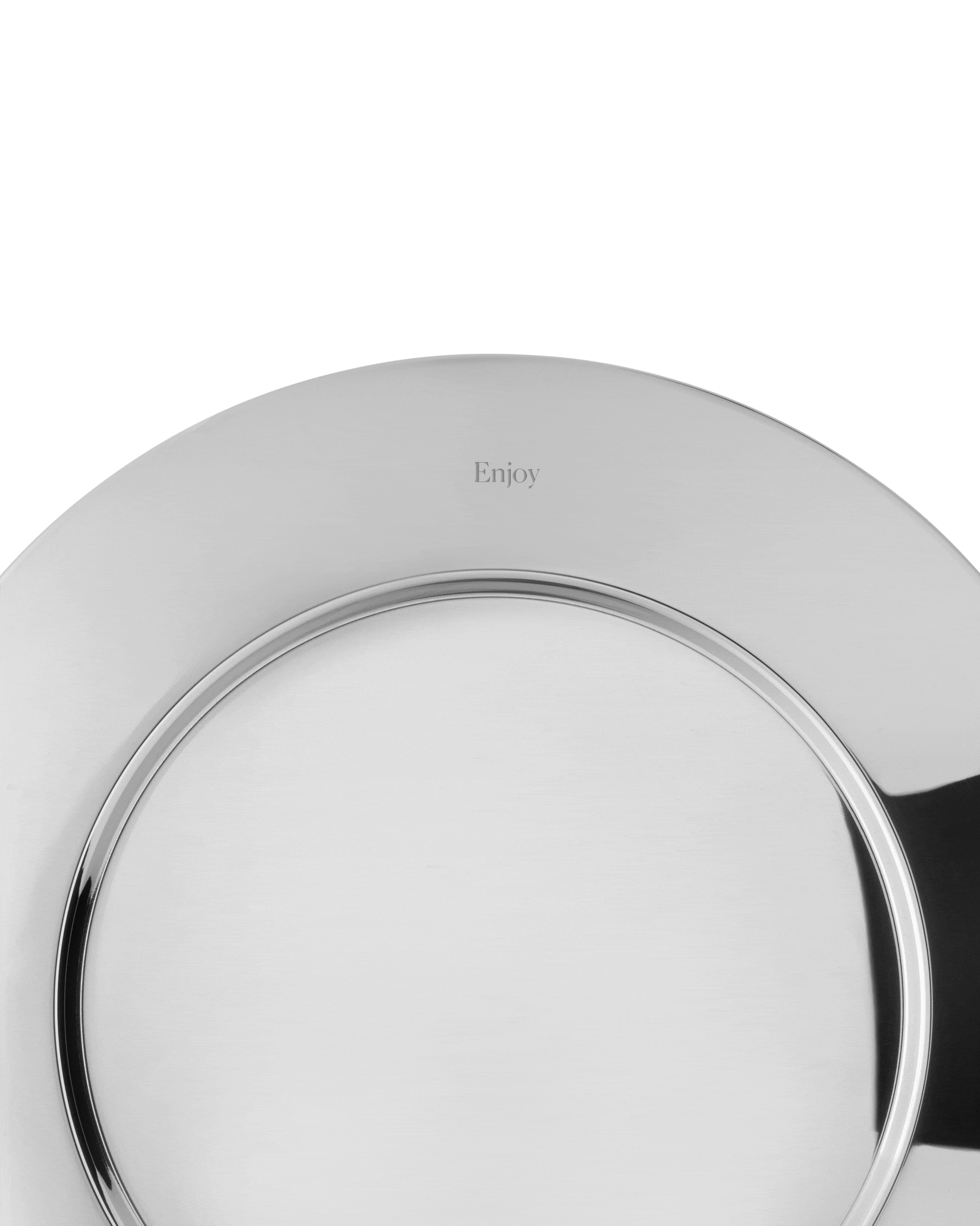 Silver metallic charger plate by Alessi, engraved with "Enjoy", featuring a glossy finish.