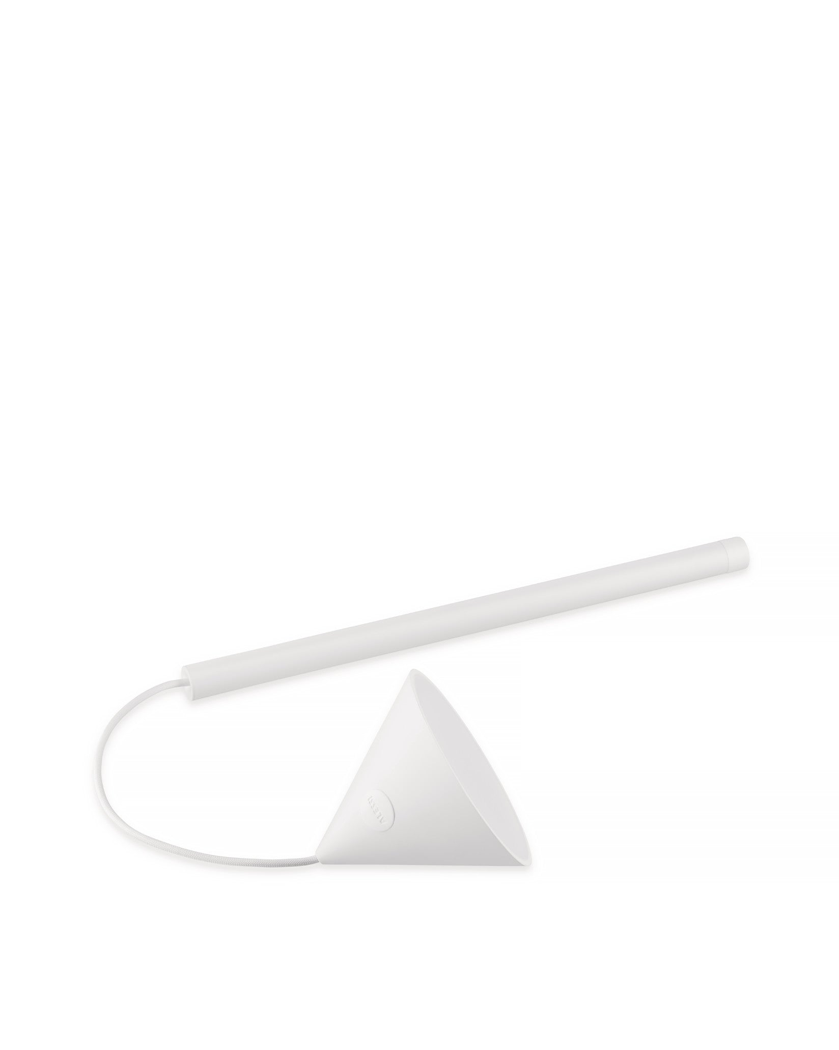 White lamp by Alessi featuring a long horizontal light tube, a triangular base with logo, and a braided cable.
