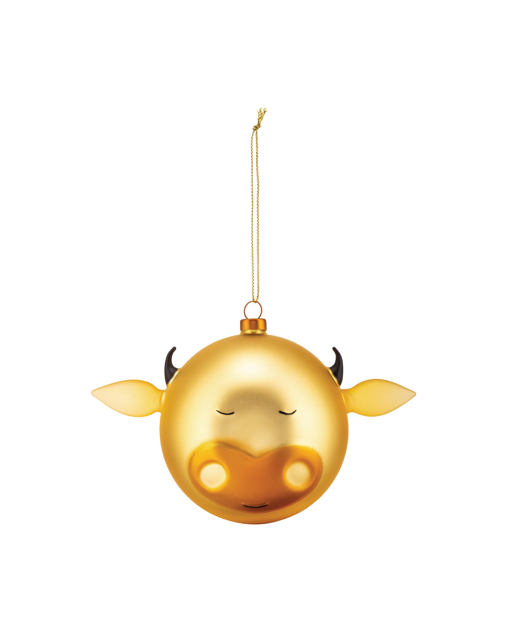 Gold glossy cow Christmas ornament by Alessi, featuring black horns, gold ears, closed eyes, and a heart-shaped snout.