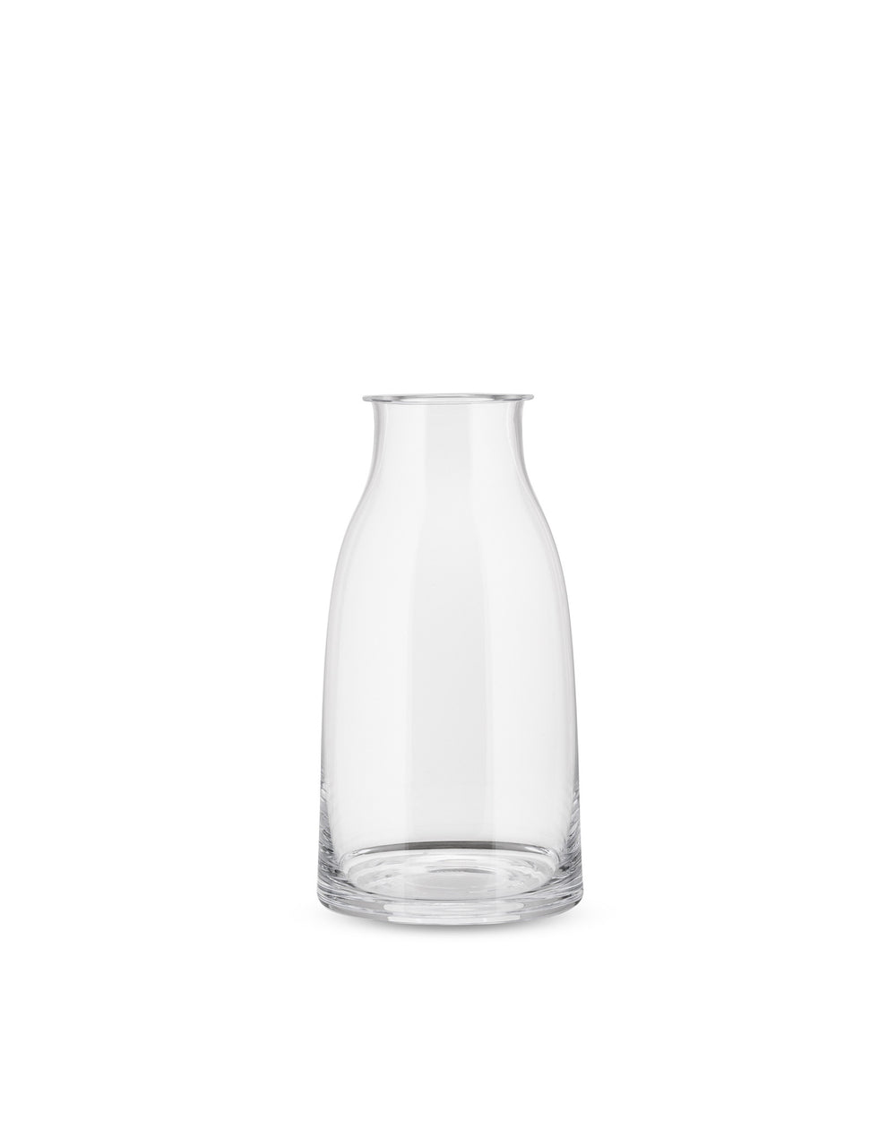 Clear glass pitcher by Alessi with a slightly flared rim and thick, wide base.